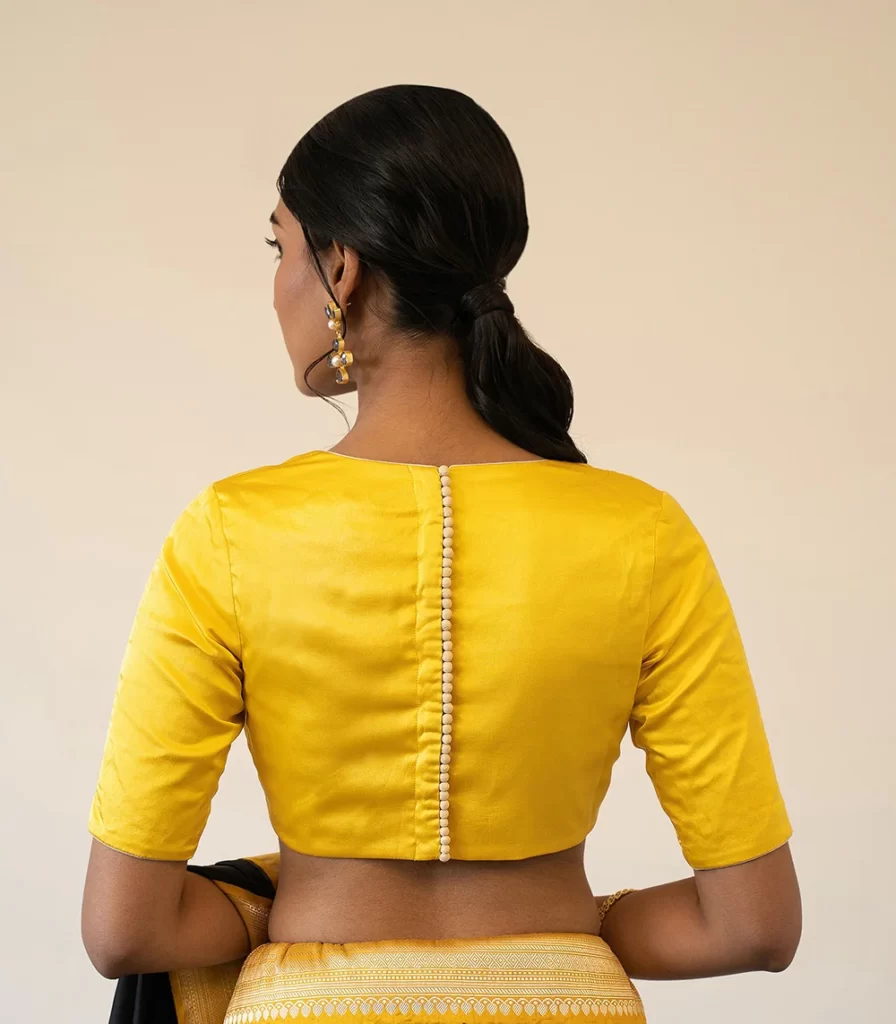 Buttoned-up back blouses design