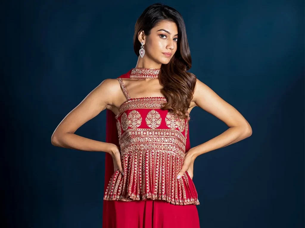 Peplum style with intricate threadwork Blouse Designs for Banarasi Sarees